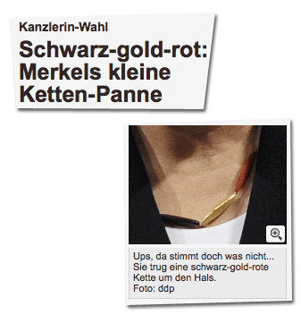 Kanzlerin-Wahl. Schwarz-gold-rot: Merkels kleine Ketten-Panne [...] Ups, da stimmt doch was nicht... Sie trug eine schwarz-gold-rote Kette um den Hals. 